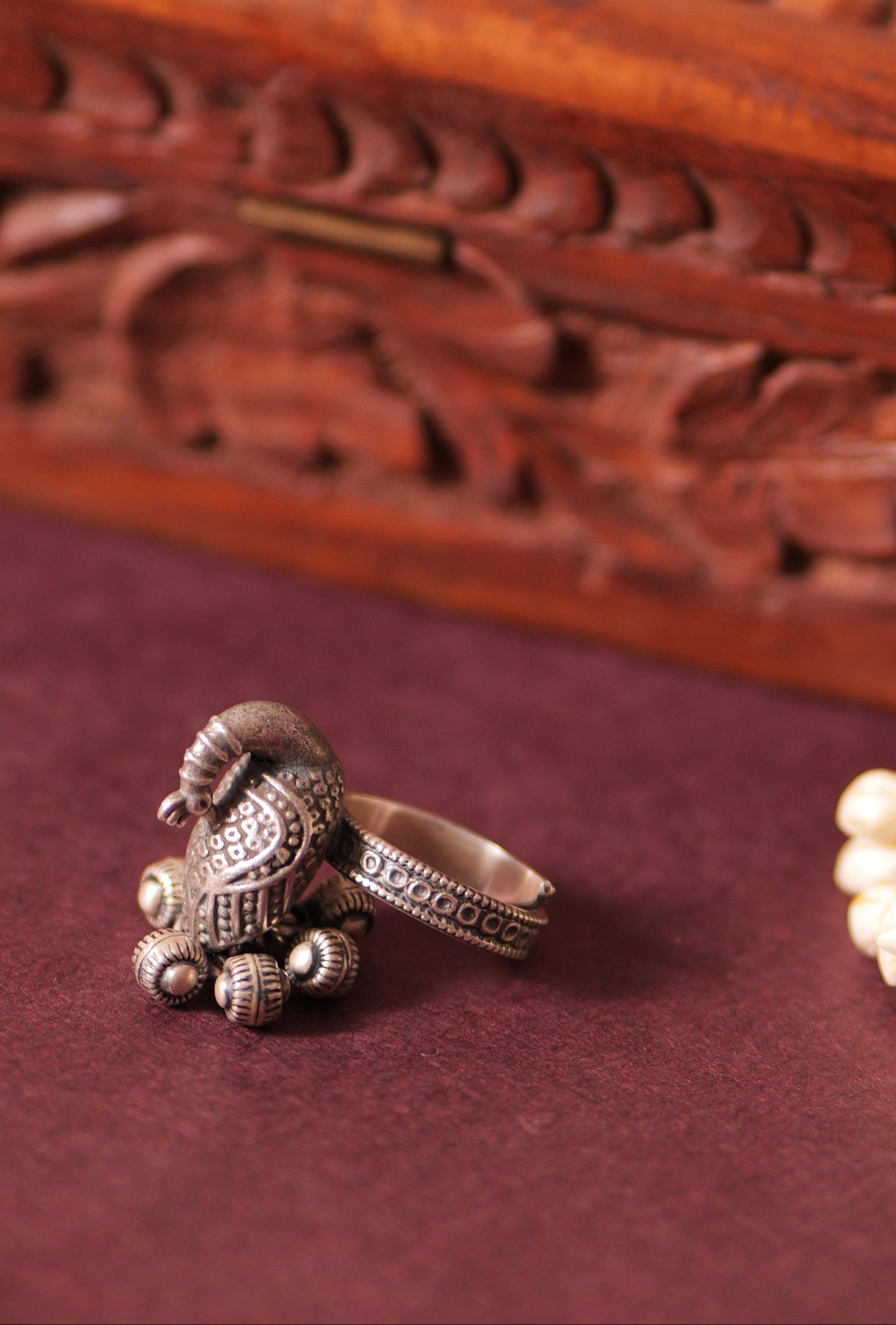 Close up of Ghughri Detailing on Antique Silver Peacock Ring