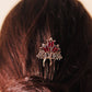 Woman wearing Traditional Silver Kundan Juda Pin in Low Bun Hairstyle for Wedding
