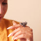 Woman wearing Broad Oxidized Silver Peacock Ring with Ethnic Outfit