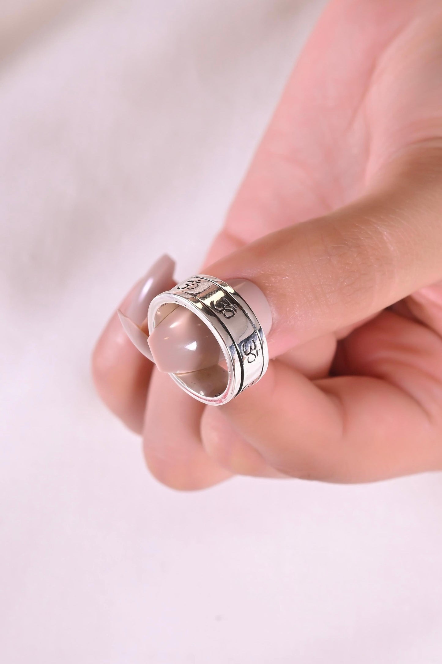 Sacred Om Rotating Band